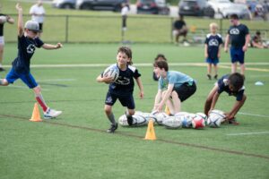 Kids playing Rugby