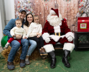 Family taking a picture with Santa